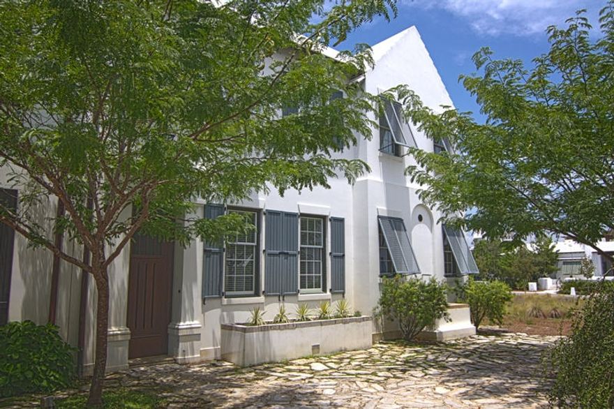 This beautifully furnished 3-bedroom, 3.5-bath home sits in the heart of Alys Beach. The 2,305-square-foot home is located along the picturesque Sea Garden Walk, a pedestrian path that runs from Lake Marilyn to the Gulf of Mexico, which allows for an easy walk or bike ride to beach. This exquisite home includes a lavish private courtyard that encompasses a refreshing plunge pool. The kitchen features stunning custom ebony cabinets and granite countertops, a large walk in pantry, as well as Bosch, Wolf, and Sub-Zero appliances. The master suite, which overlooks the courtyard, has separate closets and a spacious bath with a walk-in shower and soaking tub. Both guest bedrooms include private baths.