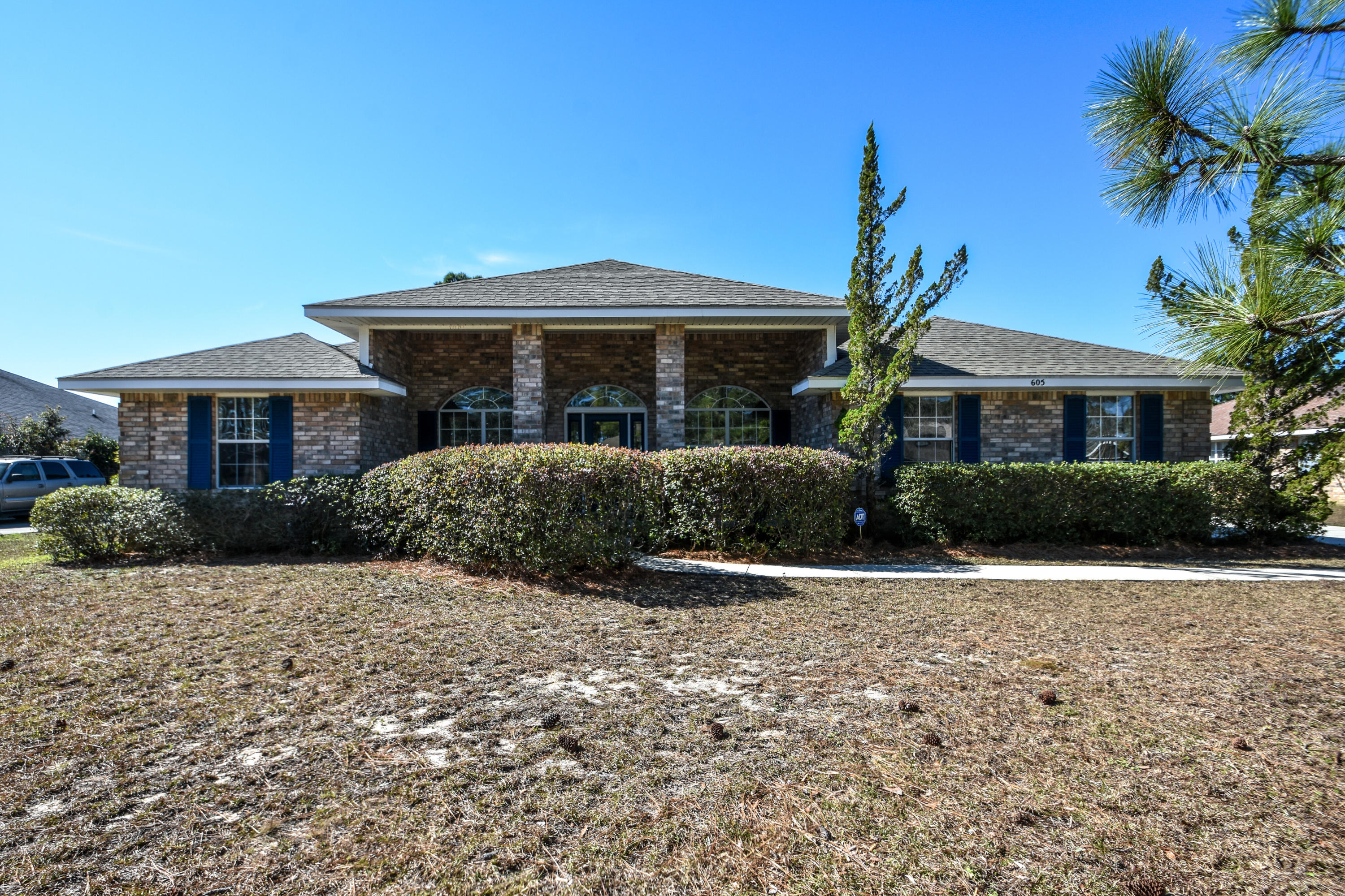 Just a short drive to Emerald Coast beaches, golf courses, Baytowne Wharf activities, restaurants, Silver Sands shopping and much more!!!! Wonderful Home on 1/2 acre! 4 bedroom/2 bath on lake! Front and rear porches! Walk to the bay, to drop in a canoe or kayak! Very open plan with french doors, maintenance free electric fireplace, Corian kitchen countertops, ceramic tile, high ceilings,custom wall finish,trey ceiling in master, jetted bath,separate shower,formal living with separate dining room, plus family room,side entry garage and more!