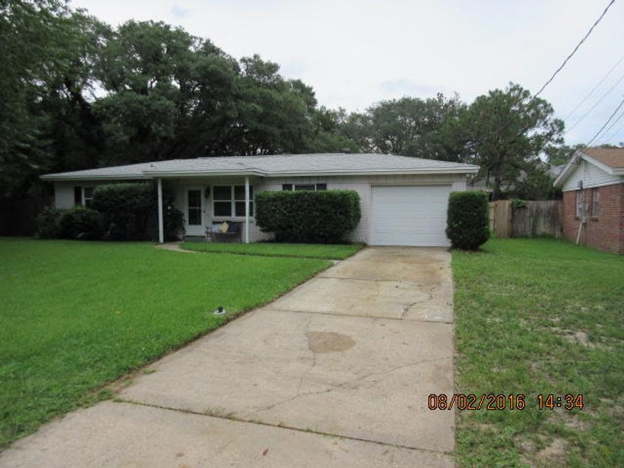 WOW!!! Check out this great house in popular Kenwood. Just a short walk to Kenwood Elementary. Enjoy the lush lawn and covered front porch. Easy maintenance in and out!!!! No carpet only tile, pergo flooring, stained concrete. Stainless appliances including microwave. Owner is providing a washer/dryer, TV, AND a pool table. The HUGE (27x23) screen porch houses the TV,pool table and a double sink. Great place to entertain. Owner is providing interior pest control, too!!! washer/dryer not warranted. NO CATS!!!! Small dog only.