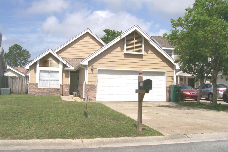 Come on in the double entry and enjoy. Soaring vaulted ceilings give this living area space for windows that provide a lot of light! The Brick Fireplace can make decorating easy. The living area, dining area and kitchen are open and airy. The flooring is wood laminate, countertops granite. Sliding glass doors take you to the open patio and privacy fenced yard. The carpeted Master has a private entrance, double vanities & spacious closet. The small bedroom could be an office. Laundry is on the way to the garage, plus the Washer & Dryer stay. Location, Location! Easy commute to Hurlburt and Eglin AFB, the NW Florida State College & Santa Rosa Mall plus 15-20 minutes to the White Sandy Beaches and Blue/Green Water of the Gulf of Mexico.