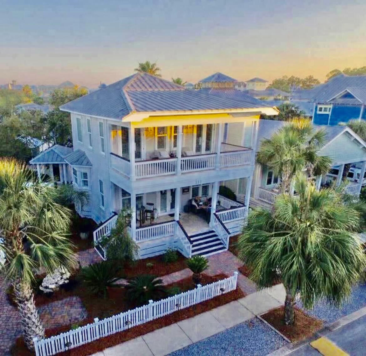 This perfect permanent home, vacation home, or investment property, ''License to Chill'' has everything you could ask for. The 2 story, 3 bedroom, 3 full bath home with possible ''bonus'' bunk or extra bedroom is a jewel. One bedroom and full bath are located on the 1st floor and the additional bedrooms and baths are located on the 2nd floor along with the ''bonus'' room. Gracious double loaded porches across the front of the home on both 1st and 2nd floors are perfect for visiting and relaxing. House is located across the street from Bellview Park heated swimming pool, tennis courts, basketball court, and children's play area. You will love cooking in the Professional Viking kitchen. This home, a short walk to the beach, is being sold furnished and move-in ready.