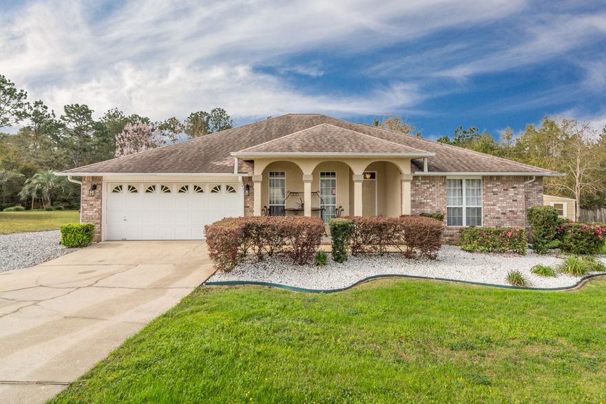 Check out this beautiful south Crestview home! This 2000+ sq ft 4/2 is well kept and ready to go. Fresh paint and a brand new HVAC system shoot this one to the top of the list! The home backs up to green space that won't be built on and there is a fantastic deck out back for you to enjoy. Separate dining room, breakfast nook, open living room, updated and upgraded finishes.  This is the one!