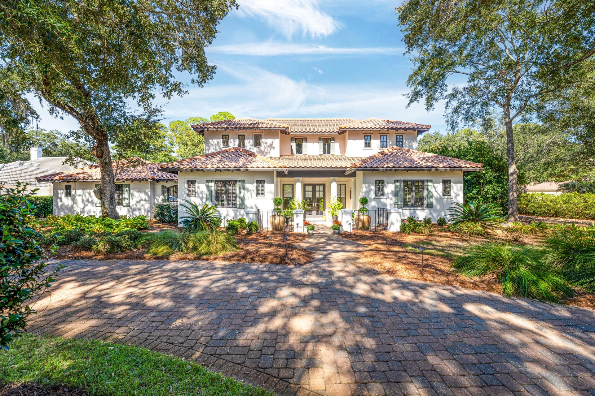 MAJOR PRICE REDUCTION!!! Nestled within THE OAKS NEIGHBORHOOD IN THE PRESTIGIOUS GATED COMMUNITY OF BURNT PINE AT SANDESTIN GOLF & BEACH RESORT sits this Beautiful Custom Home that Welcomes you with Warmth and Charm. Home has Undergone a Stunning Remodel. First Floor Main Bedroom Suite has Separate His & Her Vanities with 2 Walk In Closets. Updated Gourmet Kitchen has a Large Island with Top of the Line Appliances Appliances Opening to the Beamed Ceiling Living Area with a Fireplace Overlooking the Private Pool. Up the Wide Staircase with Wrought Iron Railing to 2nd Floor that has 2 Large Bedrooms with their own Baths and an Additional Room that could be a 4th Bedroom or TV Room. There is also an Office on the First Floor.