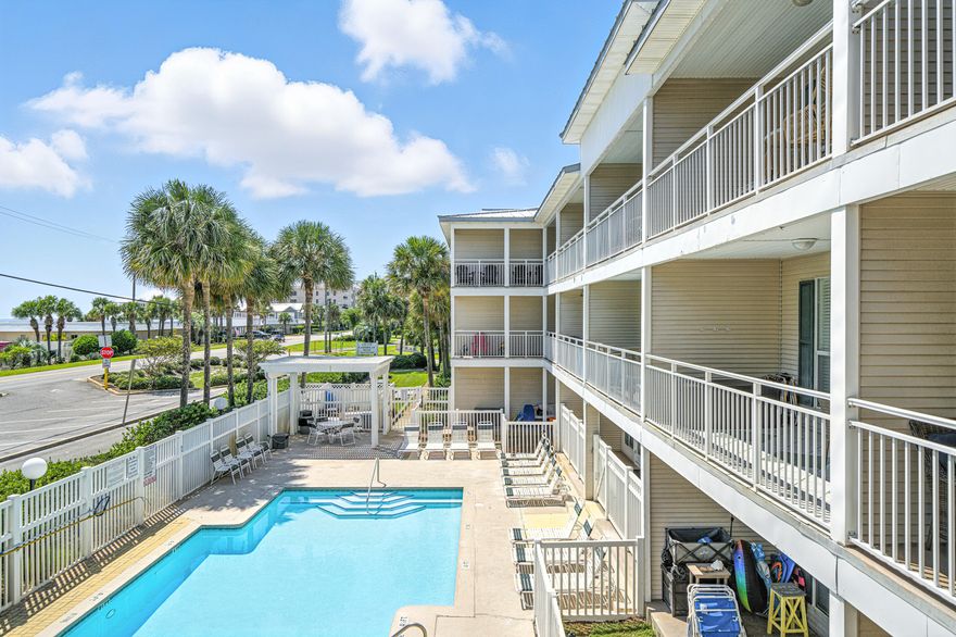 ***LOWEST PRICED CONDO IN THE BUILDING*** This perfectly located condo has 1 bed / 1 bath + hall bunks and is on the 2nd floor of this 3 story walk-up building across the street from a Public Beach Access to the Gulf of Mexico.  This unit has an exceptionally large lanai shaped like an 'L' offering great views. Full size washer/dryer in unit.  Sold completely furnished, including electronics, its ready to rent!!  HOA fees cover everything except electricity and contents insurance condo.  Contents insurance is approx. $2000 a year.  There is plenty of parking, a large pool, hot tub, a grassy area for your pets and a BBQ grill and picnic table.  The complex has passed its Milestone inspection, SIRS and has no foreseeable assessments.  Look at 'Documents' tab for governing documents.
