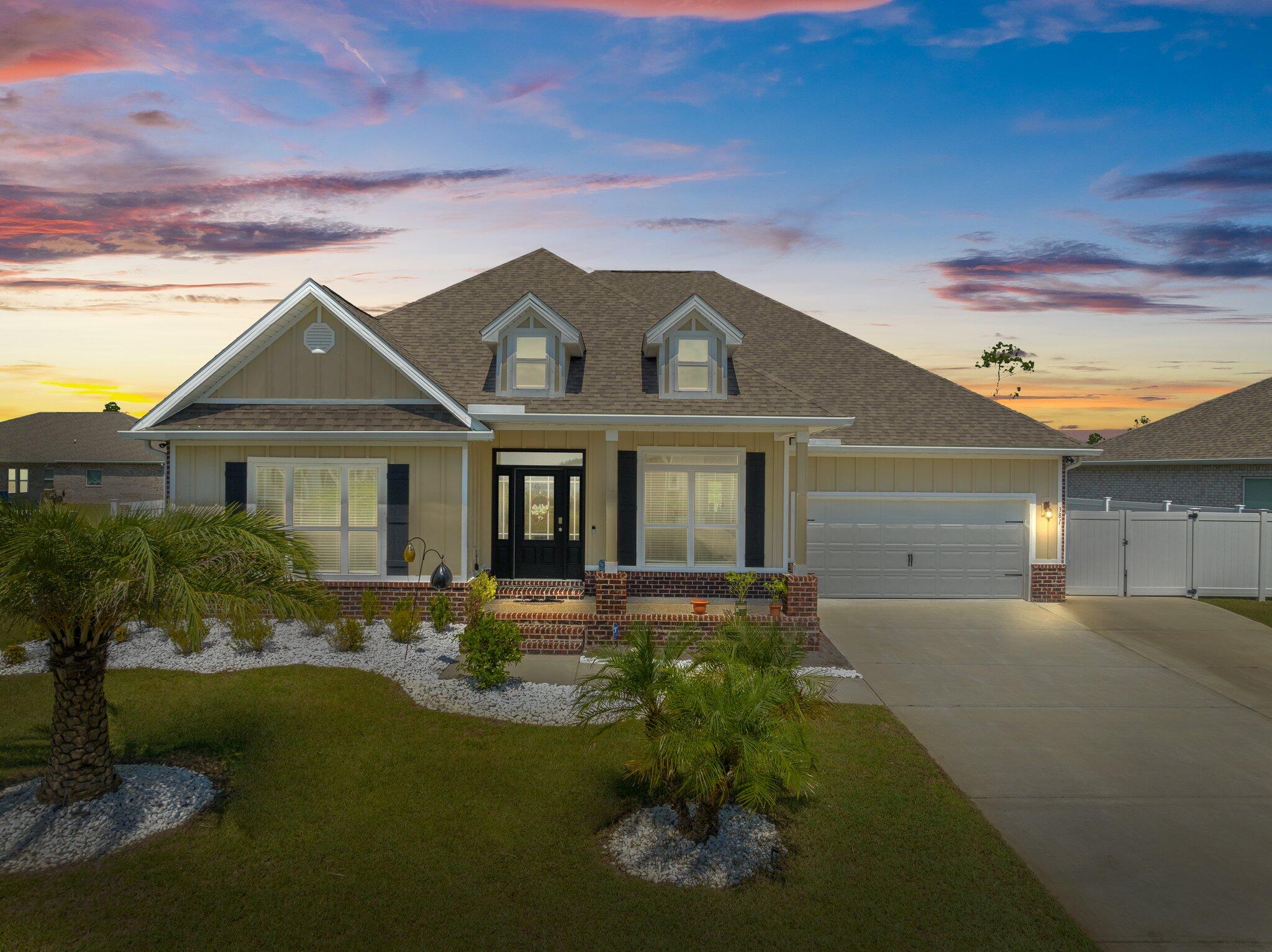 Newly constructed McKenzie floorplan with 5 bedrooms and 3-bathrooms is 3,086 SQFT. This home is located in the community of Fanning Bayou and sits across the street from the bay with beautiful water views. The outside features of this home are the 3-car wide driveway, Parking pad beyond the RV gate for boats, trailers or utility vehicles, expansive covered and screened rear porch measuring 30x30 with coated epoxy flooring. As you enter the home you will find an open and welcoming foyer, a bonus room to the left of the front entry that could double as a bedroom or flex room a large well-lit formal dining room, tray ceilings, ample storage with a large walk-in pantry, vinyl plank flooring, 10-foot ceilings and bull nose corners throughout.