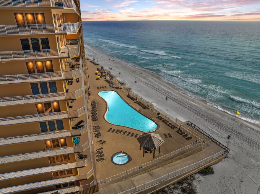 Experience a rare, completely renovated masterpiece at Treasure Island Resort. Perched on the coveted 8th floor, Unit 811 offers a top-to-bottom transformation where modern design meets the laid-back soul of the Gulf. This sun-drenched retreat features wide-plank flooring, crisp lines, and curated designer furniture that exudes ''breezy elegance.''The showstopper kitchen boasts stunning quartz countertops and premium appliances, while the smart layout includes two spacious bedrooms plus custom built-in bunk beds to sleep eight comfortably. Located on the prestigious East End near St. Andrews State Park, this turnkey unit resets the bar for luxury and rental potential. Watch emerald waves from your balcony or explore the local dining scene--this is the investment you've been waiting for...