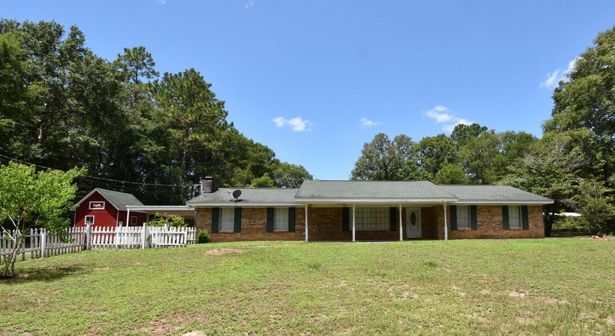 What a find! Two Acres, 2,000+ sqft., Pole Barn, Covered Porches, and Close to town! Make this your home today with a little TLC. Enjoy the peaceful country living while only being 5 minutes to the grocery store, schools and restaurants. This 3/2 home has a large kitchen with solid surface countertops, breakfast bar, and double ovens. Kitchen opens up to the Family Room, Living Room, and Dining Area with a sliding door to the covered back porch and a view of the pool area. Gunite Pool convey's as-is and needs some work to make operational. Pole Barn is on the Northwest portion of the property and Workshop is located beside the attached carport. Schedule your viewing today!