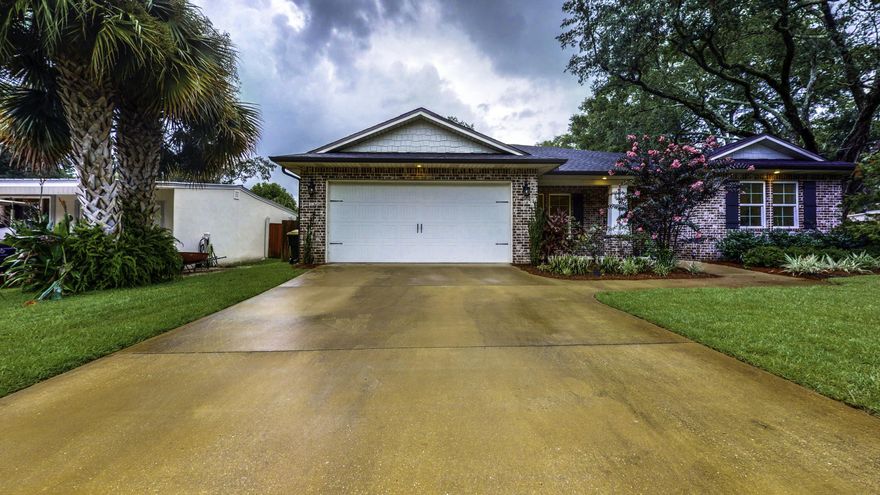 Beautiful brick home located in sought after Elliott Point neighborhood. Golf Cart community close to downtown, restaurants concerts in the park and steps away from the beaches. Open floor plan. Kitchen has a center island with breakfast bar with stainless steel appliances and gas range.  Off the kitchen, there is a breakfast nook in addition to the open formal dining room.  Fourth bedroom would make an excellent office or additional bedroom,. Large Master bedroom, with spacious bathroom with double vanities, separate shower and garden tub, and a large walk-in closet. Indoor large laundry , two car garage and tankless gas water heater. This home has a large back yard and has been well maintained. Come see this beautiful home and make it yours.