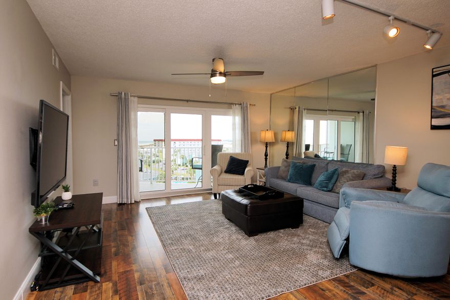 Gorgeous Gulf and sound views from this 7th floor condo at Seacrest on Okaloosa Island.  The two bed, two bath unit has been updated with vinyl plank flooring, neutral paint throughout, updated lighting and more. The kitchen has granite counters, stainless appliances, breakfast bar and a pantry. There is an in unit stackable washer and dryer. Seacrest has a heated indoor pool, outdoor pool, beach access and a fitness room. Windows and sliding doors were replaced and the building was painted in 2022. Furniture and contents will convey with the home unless new buyer requests otherwise. Contents of owner closet does not convey. Condo has an assigned covered parking spot.
