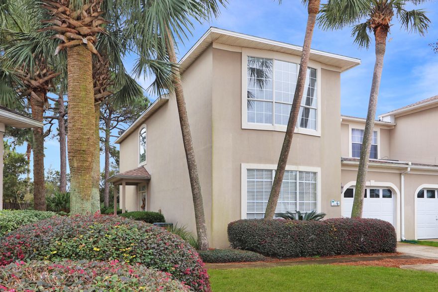 Elegantly updated family home in quiet Miramar Beach neighborhood with new flooring, updated fixtures, granite countertops, and paint is move in ready for you and your family! This three-bedroom, two bath home with wood-look tile plank flooring throughout the main areas of the home along with the gas fireplace, skylight and modern light fixtures truly creating the perfect ambiance for your new home. The raised ceilings in the living and dining areas allow in a great amount of light creating a spacious first floor perfect for entertaining family and friends.Many great conveniences in this home including direct access to the kitchen from the garage for unloading ease, 2018 installation of a brand new roof, first floor master bedroom and laundry, screened patio directly off the