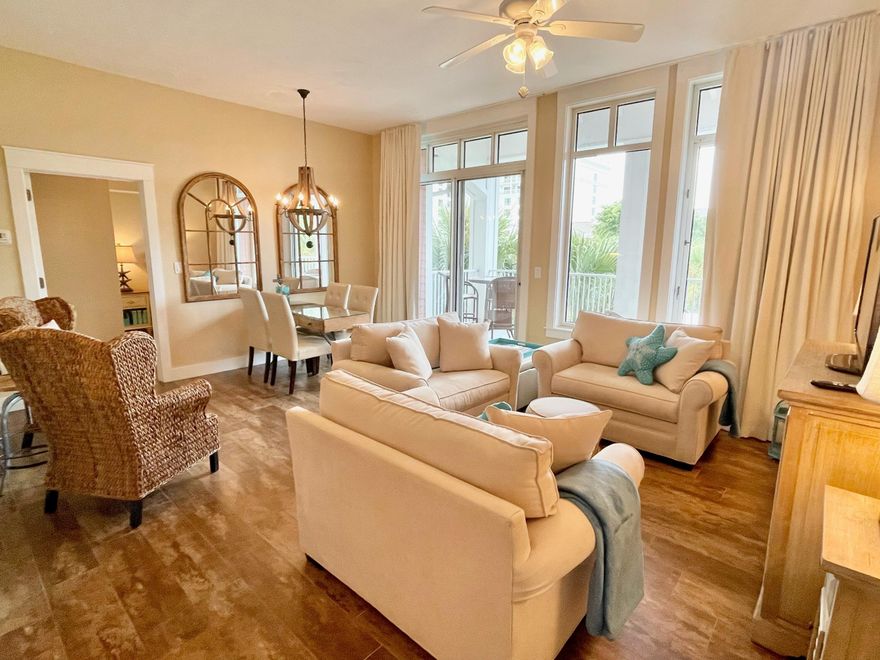 This is a beautifully updated 5th Floor Market Street Inn condominium located in The Village of Baytowne Wharf. Sold furnished (excluding a few personal items). This lock-off condo provides maximum rental capabilities (2-bedroom or 1-bedroom & studio). Make memories in the fully stocked kitchen preparing delicious meals on the granite countertops. You and your guests will feel like everyday is a vacation with a calming color palette and coastal furnishings and decor.  Enjoy the comfort of a king-sized bed in the Master Bedroom. Guests will enjoy their privacy in the Studio, featuring two queen beds and a kitchenette.  This unit has large windows for great views and plenty of natural sunlight. Also, enjoy relaxing outdoors on your spacious balcony!