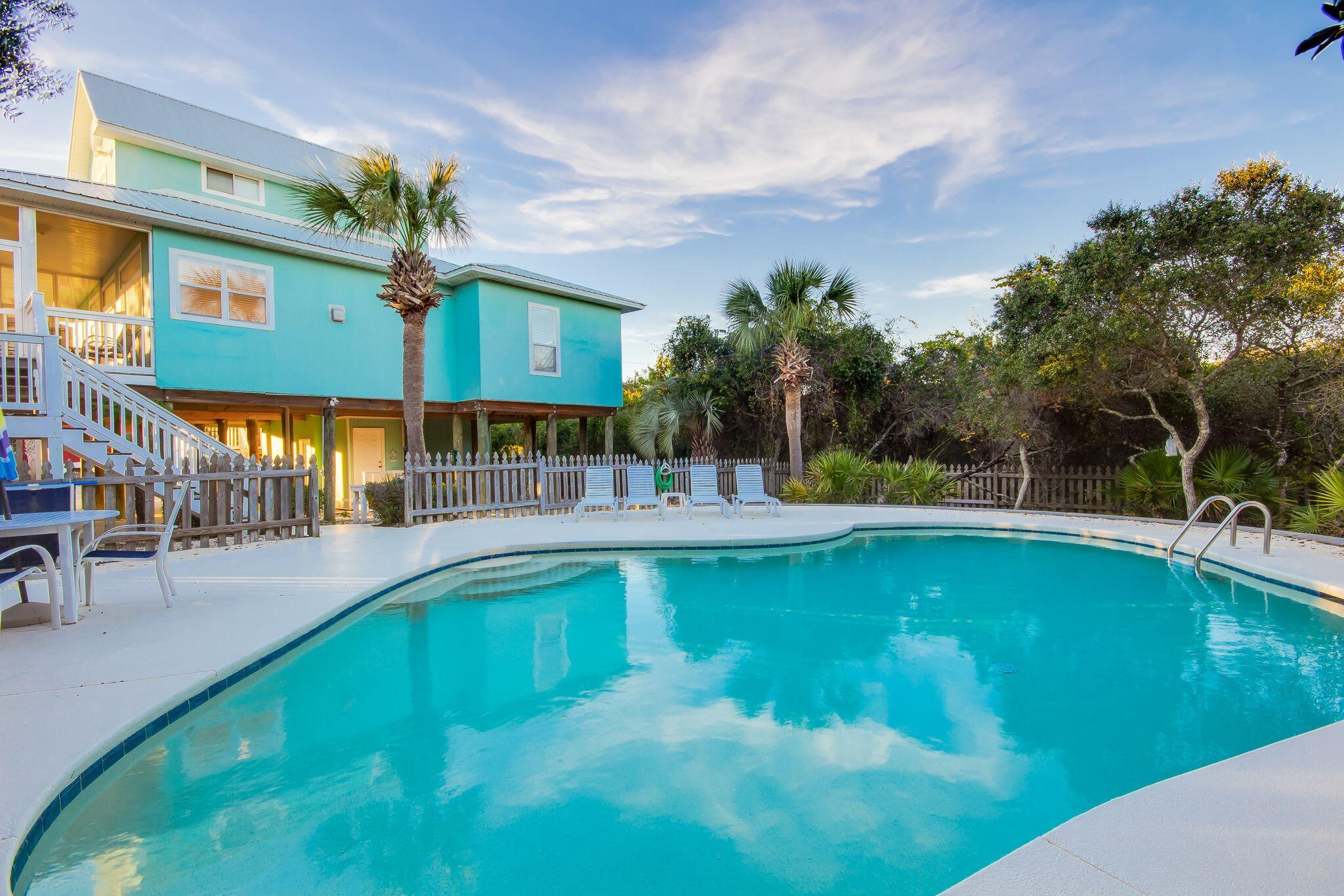 30A Original Owner!! Blue Mountain Beach. Home is sold completely Furnished! Vacation Rental ready earning $147K per year. Among many other benefits, you can enjoy a view of the Gulf from the second-floor patio deck, a fantastic Gulf view from the third-level private balcony, and a very short walk, just 315 feet to the beach. Features a screened covered porch and an open sun deck off of the living area. The master suite upstairs offers another beautiful open sun deck with gorgeous views of the gulf and sunsets. The 28' x 22' pool is very private with a poolside 1/2 bath.