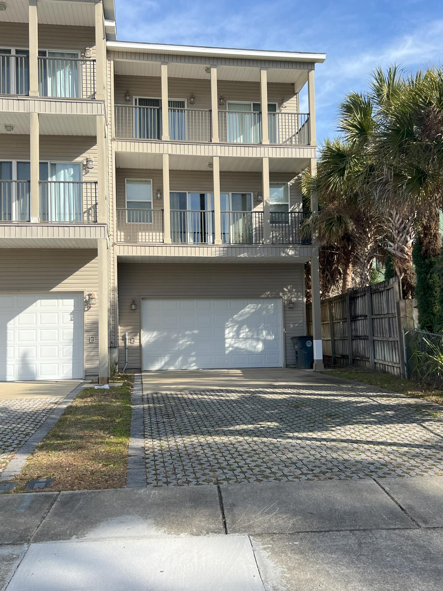 2 bedroom townhouse overlooking Tom's Bayou in Valparaiso, convenient to Eglin AFB's East gate. This townhome has a two-car garage with automatic garage door opener, a stackable washer and dryer and a spectacular view of Tom's Bayou from two balconies (one off the 3rd floor bedrooms and one off the living area). There is a full bathroom shared by the two bedrooms on the 3rd floor and a half bath on the 2nd floor, convenient to the living area. The kitchen is complete with stainless steel appliances (fridge, dishwasher, stove & built-in microwave). Tenant responsible for all utilities. Pets will be considered with a non-refundable pet fee. One year lease, security deposit and application fee required.
