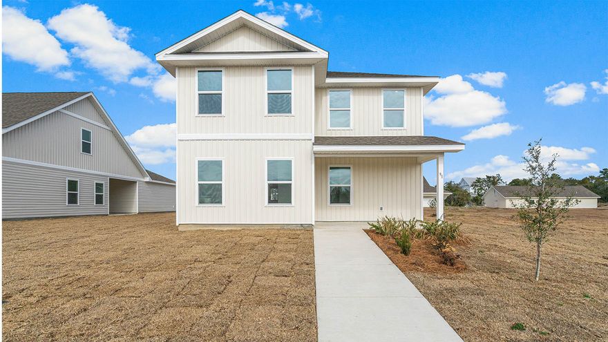 The Owl's Head community is conveniently located off of Highway 331 in Freeport.  We are only 8 miles to Interstate 10, and 16 miles to beautiful beaches and Highway 30 A.  We offer 6 floor plans, 3 and 4 bedrooms.  All homes have rear entry garages.  This community offers a community area with paved walking trails and a spring fed lake. | The Inzer is a 2 story 4 bedroom, 2 1/2 bathroom home.  The primary bedroom is on the first level. 3 bedrooms are on the second floor with a flex space.  This home offers a Front and back covered porches. This home has a half bath downstairs, that is perfect for guests.