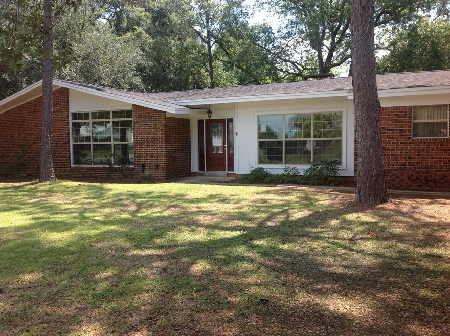 Newly renovated throughout, starting with the beautiful new front door! Four bedrooms on a large corner lot. New Kitchen with granite tops,tile backsplash, new cabinets and stainless appliances. Freshly painted, new carpet in bedrooms and New Pergo and tile floors in the rest of the home. Upgraded baths and all new copper wiring throughout. A/C serviced, new lantern at the side driveway entrance. Not sure of age of roof but has been replaced twice since present owner purchased in 1972.Large privacy fenced back yard with room for a pool! Work shop has A/C and Electric. Concrete pad in back yard for boat or RV, double gate entrance.Great location approx.10-12 minutes to Hurlburt or Eglin AFB.