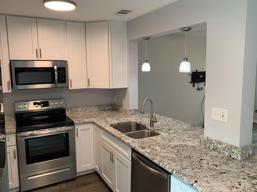 Beautifully remodeled townhome located in central Destin. Featured upgrades in 2021 include...Privacy Fence, LVP Flooring Throughout, Kitchen Cabinets, Granite Counter Tops, Refrigerator (Samsung), Cooktop Stove (Frigidaire), Microwave (Frigidaire), Washer & Dryer (Amana), 50 Gallon Water Heater. New exterior electrical panel, windows and doors in 2022.