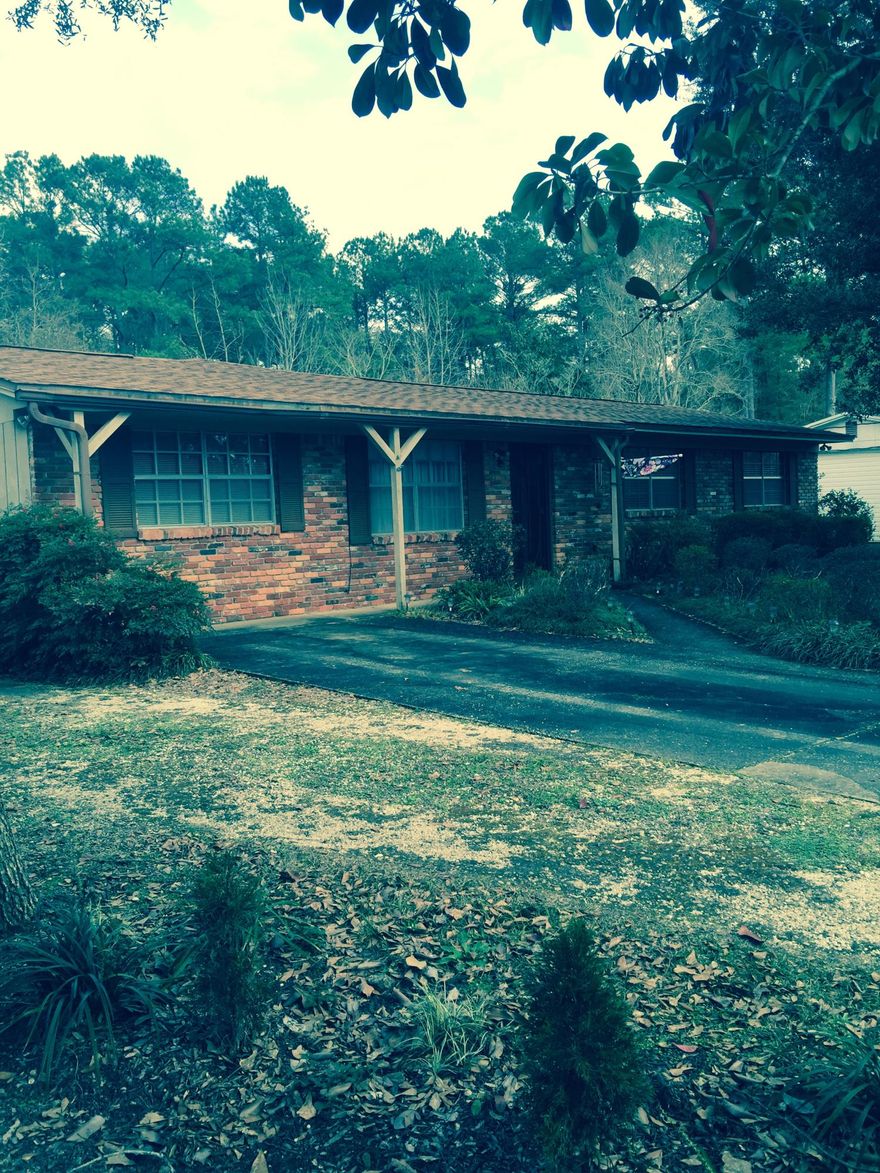 Four bedroom home, close to schools and shopping! 28 X 32 workshop, with an all cedar closet. There is a fenced backyard, a large den and separate living room. There is an additional office or sewing room, and there are two HVAC systems, one is a heat pump. Enjoy the porch and swings outside beneath the jasmine bushes. The addition was added in 1990, and the kitchen was remodeled in 1994.