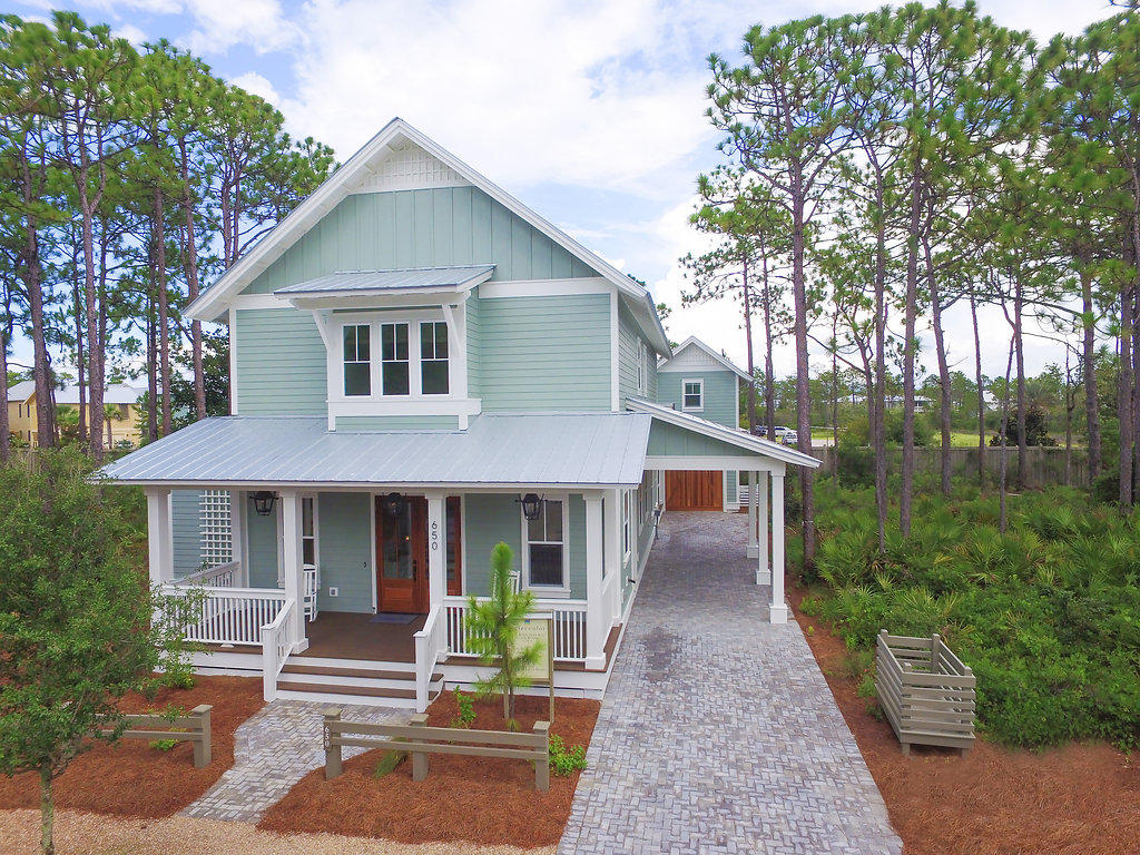 Far reaching sight lines, great traffic patterns & room placement combine to create a home you will fall in love with. Amazing Rental Potential makes this home a smart investment.This 3038 sq ft two story plan creates an abundance of room by giving the children space in their retreat and Bunk Room with 4 Bunks while enabling privacy in your secluded owners retreat. The beautiful master suite includes a luxurious bathroom and large walk-in closet. The spacious kitchen with adjoining family room are perfect for entertaining family and friends. This home features an amazing outdoor living with a fireplace & saltwater pool/spa with an outdoor shower.