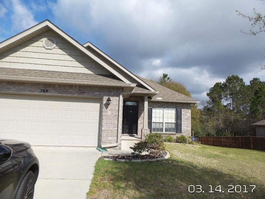 Available 3/6/2019......Highly desired Rolling Ridge subdivision features this 3/2 home w/many beautiful upgrades. South of I-10 convenience gives easy access to Duke, Special Forces Compound, Eglin, beaches & shopping. All brick home boasts, cathedral ceilings, 18 inch tile in all areas except bedrooms. Solid black appliances, kitchen island, eat in kitchen and plenty of counter-top space and cabinets for storage. Master bedroom has treyed ceilings and room or king size furniture with large walk in closet. Exterior features include large back deck for entertaining, sprinkler system for worry free watering, curbed flower beds and large 2 car garage. No inside smoking. Dogs(under 25lbs)may be allowed w/approval & $400 fee. No CATS please(allergies). Lawn care included in rental rate.