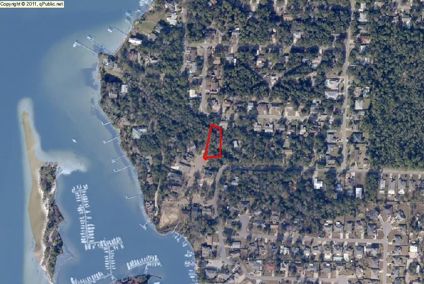 BANK OWNED LOT in fabulous New Orleans style waterfront community! The Parish boasts pavered roads and driveways, lush landscaping, and a great location on Wards Cove bayou. These interior lots give you the opportunity to get into a high end community at an affordable price. Possible owner financing to qualified buyers. Sold As Is. All information is approximate and should be verified.