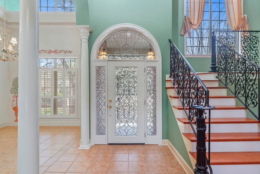 Prestige and value! Come home to Old South Dr! This exclusive neighborhood features upscale homes in North West Crestview. This custom home is an exclusive design with extras that are a must see! The two story design and the massive live oak trees draw you through the brick lamp post entry to the leaded glass front door. As you enter, the wrought iron hardwood staircase leads your eyes across the landing to the balcony over looking the living room. You feel majestic in the presence of the many columns , high ceilings, and natural light from the gigantic windows. All the bed rooms have their own full bath . The master bath's jacuzzie tub will wash away the day in lilac and lavender. An additional bed room has an extra large closet , built in desk and book case, window seat and