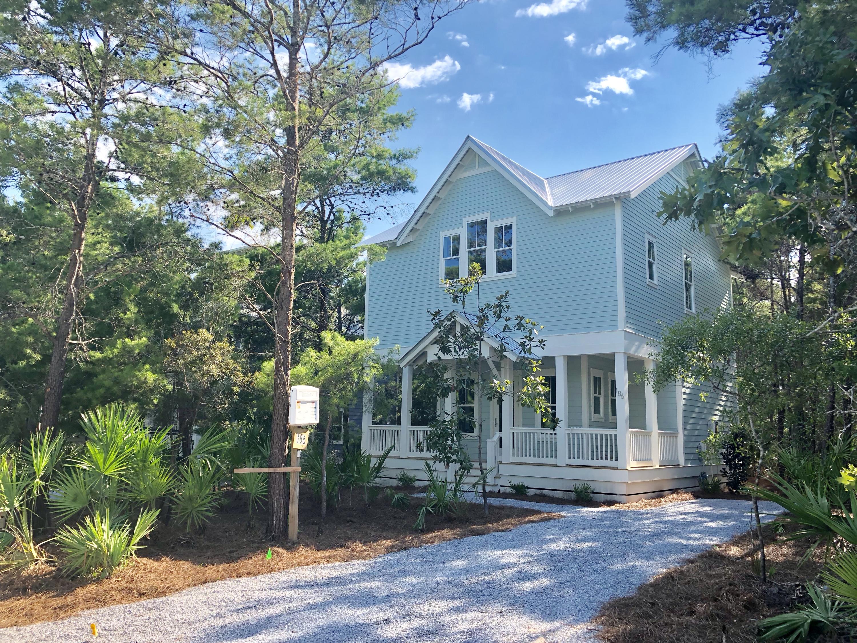 BEAUTIFUL NEW CONSTRUCTION SOUTH OF 30A! This adorable beach cottage is nestled along a quiet,tree-lined street in desirable Seagrove Beach. If you've always wanted to enjoy peaceful coastal living but be close to all that 30A has to offer, then look no further. Seaside and the Hub are an easy bike ride away. Eastern Lake, perfect for putting in your kayak, and the gorgeous emerald waters of the Gulf of Mexico are within 1/4 mile of your front door. This home has an open concept living/kitchen area, 1/2 bath, and possible office, mudroom, or bunk room on the main floor. Whitewashed hardwood floors and Quartz countertops throughout. The master bedroom on the second floor boasts a vaulted ceiling with cypress beams, his and hers walk-in closets, and a spa-like bathroom with floor to ceiling