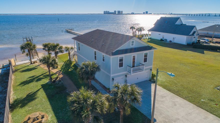 AMAZING SUNSETS are in your future with this WATERFRONT HOME that boasts PANORAMIC VIEWS of the Sound and Skyline throughout the home! Built in 2016, this home is centered around EASY LIVING for full enjoyment of the FLORIDA LIFESTYLE. The 2nd Story has an OPEN FLOOR PLAN containing the Living Area, Kitchen & Dining Areas filled with WALLS OF WINDOWS for NATURAL LIGHT and views of your WATERFRONT BACKYARD! The kitchen boasts CUSTOM LAVA STONE COUNTERS, STAINLESS STEEL APPLIANCES, LARGE BREAKFAST BAR, WALK IN PANTRY & ample cabinet storage. Enjoy SUNSETS on your PRIVATE BALCONY while eating dinner or enjoying your favorite beverage! The MASTER SUITE has a LARGE WALK in CLOSET & SPACIOUS ONSUITE BATHROOM with a SOAKER TUB & separate TILED WALK in SHOWER. See Additional Comments...
