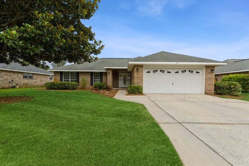 Look no further!  All brick, single level home in a great neighborhood featuring four bedrooms, two baths, hardwood and tile floors throughout.  Freshly painted, scrapped ceilings, clean and move-in ready!  Split bedroom floor plan, stainless appliances including a brand new stove just delivered, vaulted ceiling in great room, fenced in backyard, community pool. Convenient location close to Sacred Heart Hospital, Grand Boulevard for shopping, restaurants, movies, and of course our beautiful beaches!  As always, all dimensions and fees important to the buyer should be verified.