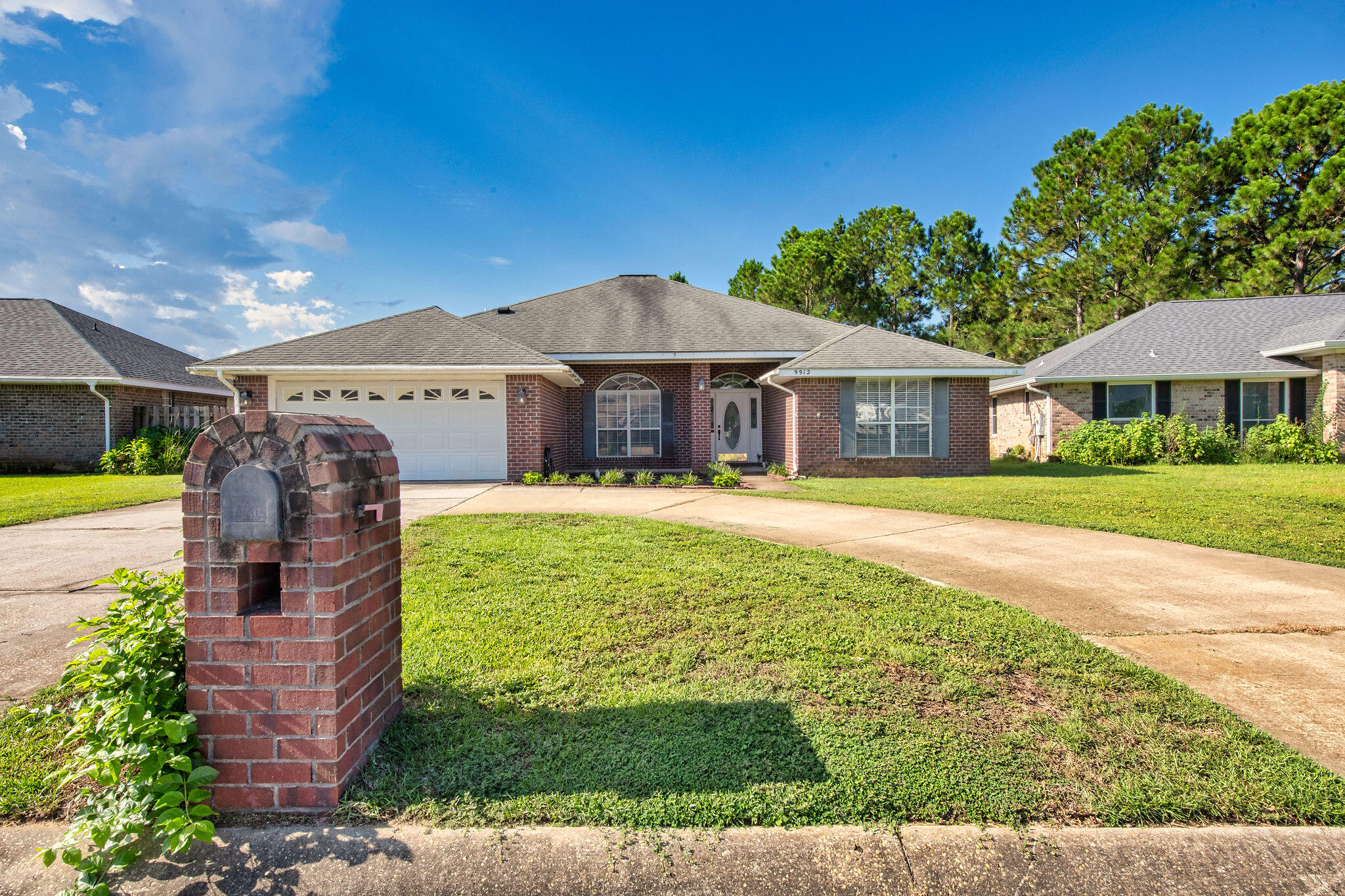 Immaculately cared-for 4-bedroom residence in East Navarre! This light-filled home offers a flowing layout with vaulted ceilings and expansive windows that welcome natural sunlight throughout. The gourmet kitchen is outfitted with quartz counters, stainless appliances, and abundant prep space, opening seamlessly into a cozy living area ideal for gatherings or quiet evenings. The owner's suite provides a spacious retreat with a walk-in closet, while the en-suite bath boasts granite finishes, stylish lighting, and a luxurious soaking tub. Outdoors, enjoy barbecues on the patio in the fenced backyard. Schedule a showing today! The expansive primary suite offers a sunny retreat with a generous walk-in closet, while the en-suite bath is appointed with granite countertops, updated fixtures, and an oversized soaking tub. Step outside to enjoy summer cookouts on the open patio, or enjoy the fenced backyard greenspace.