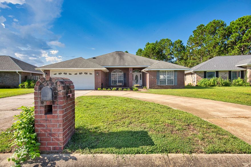 Immaculately cared-for 4-bedroom residence in East Navarre! This light-filled home offers a flowing layout with vaulted ceilings and expansive windows that welcome natural sunlight throughout. The gourmet kitchen is outfitted with quartz counters, stainless appliances, and abundant prep space, opening seamlessly into a cozy living area ideal for gatherings or quiet evenings. The owner's suite provides a spacious retreat with a walk-in closet, while the en-suite bath boasts granite finishes, stylish lighting, and a luxurious soaking tub. Outdoors, enjoy barbecues on the patio in the fenced backyard. Schedule a showing today! The expansive primary suite offers a sunny retreat with a generous walk-in closet, while the en-suite bath is appointed with granite countertops, updated fixtures, and an oversized soaking tub. Step outside to enjoy summer cookouts on the open patio, or enjoy the fenced backyard greenspace.