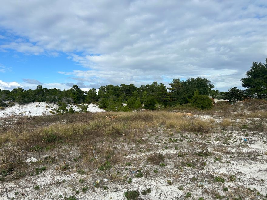 One of the very few remaining large tracts of land available in Destin. Higher elevation. This 9.18 +/- acreage is located on the North side of Highway 98.It is across Hwy 98 from the Gulf of Mexico, close to shopping, restaurants, amusement parks, and gulf front condos. This parcel is zoned TCMU 'Town Center Mixed Use' perfect for hotels, retail, or health care development. Under ground retention would benefit density.This property sold for $16M in 2004. Click on 'Documents Tab' for survey, Zoning, Assignment of Beach Access, Easement, Geotechnical Engineering Report, Title Policy, and Appraisal.Buyer to confirm all information.