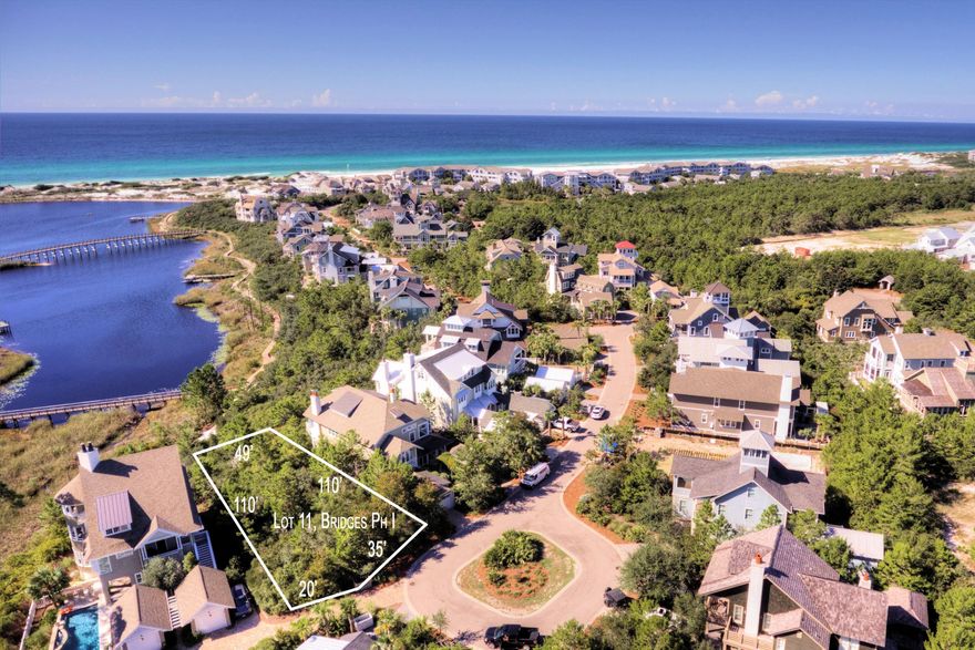 Unobstructed gulf views! Relax and enjoy the views of Camp Creek Lake and the Gulf of Mexico! This is the only available lakefront home site located in the controlled access neighborhood of Watersound Beach's Bridges. It hardly needs to be said that the water is the focus of life in the Bridges. Camp Creek Lake, a rare coastal dune lake, is a leisurely stroll away from the Gulf of Mexico. A bridge crosses over the slender southwestern finger and leads to the beach where towering dunes of white sand slope gently into the warm, emerald waters of the Gulf. Watersound maritime character is in perfect harmony with the environment. Northerly clapboard, shingles, shutters and shakes in an inspired marriage to porches, awnings and shade provide overhangs set against a windswept dunescape. Watersound amenities include neighborhood pools, clubhouse, fitness center, foot paths, dune walk overs to the beach and a post office.  As an owner, additional amenities are available through the purchase of one of three St. Joe Club & Resort memberships.  Click on documents for additional information.  Buyers fee of .5% or purchase price payable to St. Joe Community Fnd and .5% of purchase price payable to WaterSound HOA at closing.