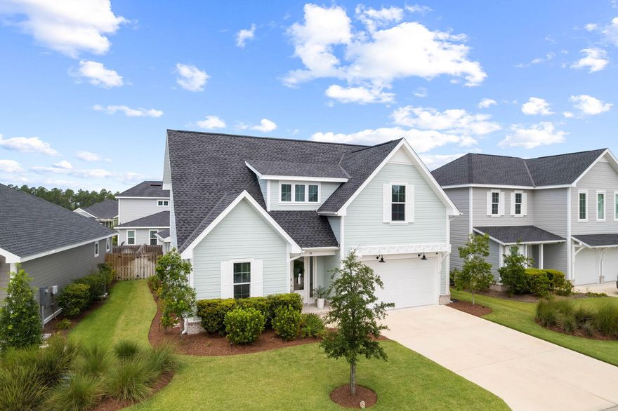 Welcome to a charming 4-bedroom, 3.5-bathroom Draper Floor Plan home nestled within the mature Watersound Origins community. This two-story gem boasts an open floor plan with 9' ceilings, opulent vinyl plank flooring, quartz kitchen and bathroom countertops,. With a 2-car garage, parking and storage are a breeze. Step onto the porch and admire the heirloom brick accents. The exterior features a well-designed irrigation system for lush landscaping maintenance. Watersound Origins amenities include access to the Village Commons pool and fitness center, expansive nature trails for outdoor enthusiasts, dock access to Lake Powell for water activities, unlimited golf, and more.  Buyer to verify all info and dimensions.
