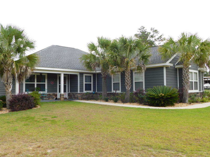 Custom built Oasis on 1.2 acres. In ground salt water pool is surrounded by fire pit, cabana area, multiple seating and party areas, exterior lighting, privacy fencing and so much more. This one owner, custom built home has very nice upgrades throughout the entire home. Refinished antigues serve as built-ins, tiled walk-in shower, high class lighting T/O. The kitchen has soft-close doors, under cabinet lighting, stainless streel farm style sink, built in wall stove, textured ceilings T/O. There is a wood burning fireplace, interior laundry room, vaulted and trayed ceilings and so much more to enjoy. The back yard is a real entertainment spot and there is still over 1/2 acre left wooded for running and exploring in. There is also an in ground sprinkler system around the house.