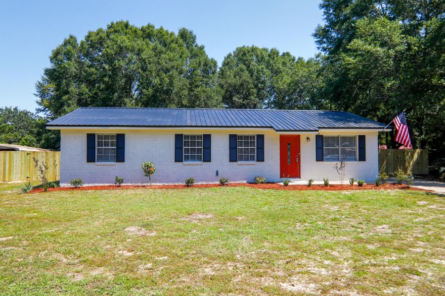 An absolutely beautiful & complete remodel in the heart of Crestview, South of Hwy 90! Metal roof WOW!! New A/C July 2020. New updated kitchen and baths! New granite, new fans and new lights! New luxury vinyl plank floors! New exterior fence with new gates! These features are the makings of a great home for you & yours! Come make this house your new home today!