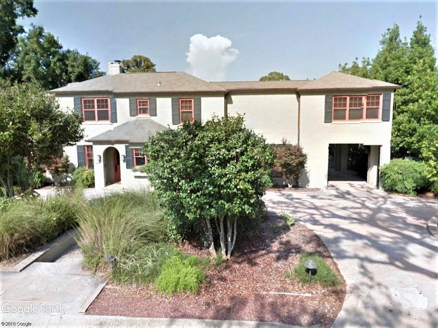 This historic East Hill home is less than a block from beautiful Bayview Park and is on Bayou Texar providing amazing views of the water from almost every room. This home features a three tiered backyard perfect for entertaining or just enjoying the natural beauty. The middle tier features an elongated pool that is perfect for lap swimming while overlooking Bayou Texar. The middle tier also has a sunken Jacuzzi and a bath house with a steam shower. The lower tier is slightly sloping and well manicured ending at the shoreline and a covered dock with two boat lifts. Moving inside, you will find a spacious downstairs living area that includes a great room, formal dining room, kitchen, walk in pantry, half bath, and sitting room, all with plenty of windows providing natural lighting. Downstair