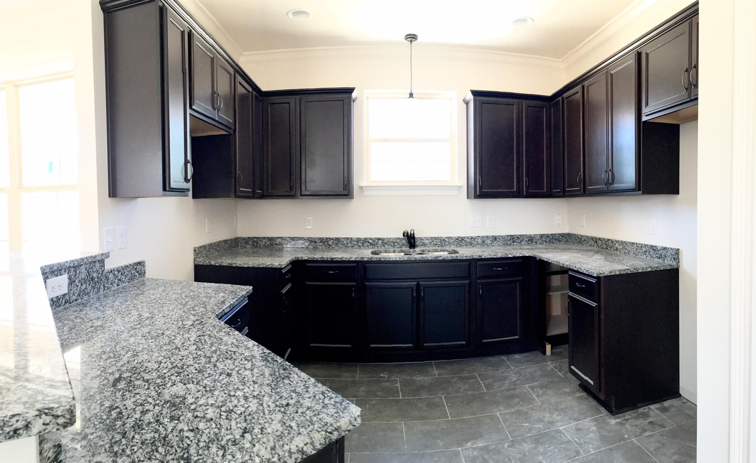 BRAND NEW 4bd, 2ba in the heart of Niceville! A beautiful split, open floor plan with laminate wood flooring in all main areas including the Master Suite. The kitchen offers 3cm granite countertops, dark espresso cabinets, large breakfast bar and stainless steel appliances. The Master suite, secluded from the other bedrooms, includes a walk-in shower, double vanity with cultured marble tops, and a huge walk-in closet. Add'l features: Crown molding in the main living areas, 8' doors throughout, recessed lighting in main areas, plenty of storage, beautiful landscaping with irrigation, privacy fence and a 1-yr builder warranty. Zoned for A+ Niceville schools and just a short drive to Eglin AFB or the beaches of Destin!