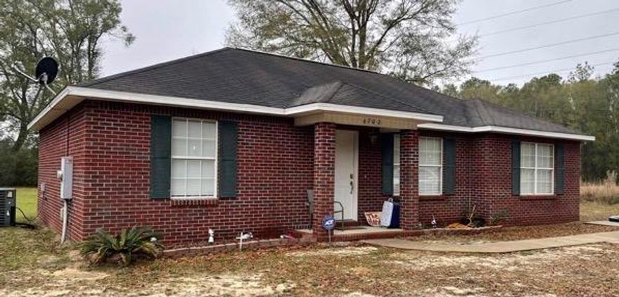 Adorable all brick 3 bed / 2 bath home on a flat 1 acre lot. Convenient location to I-10. Desirable split bedroom floor with open living room features vaulted ceiling and wood flooring.  Tile in the dining, kitchen, & baths. Master bath features a tiled shower/soaking tub and walk in closet.