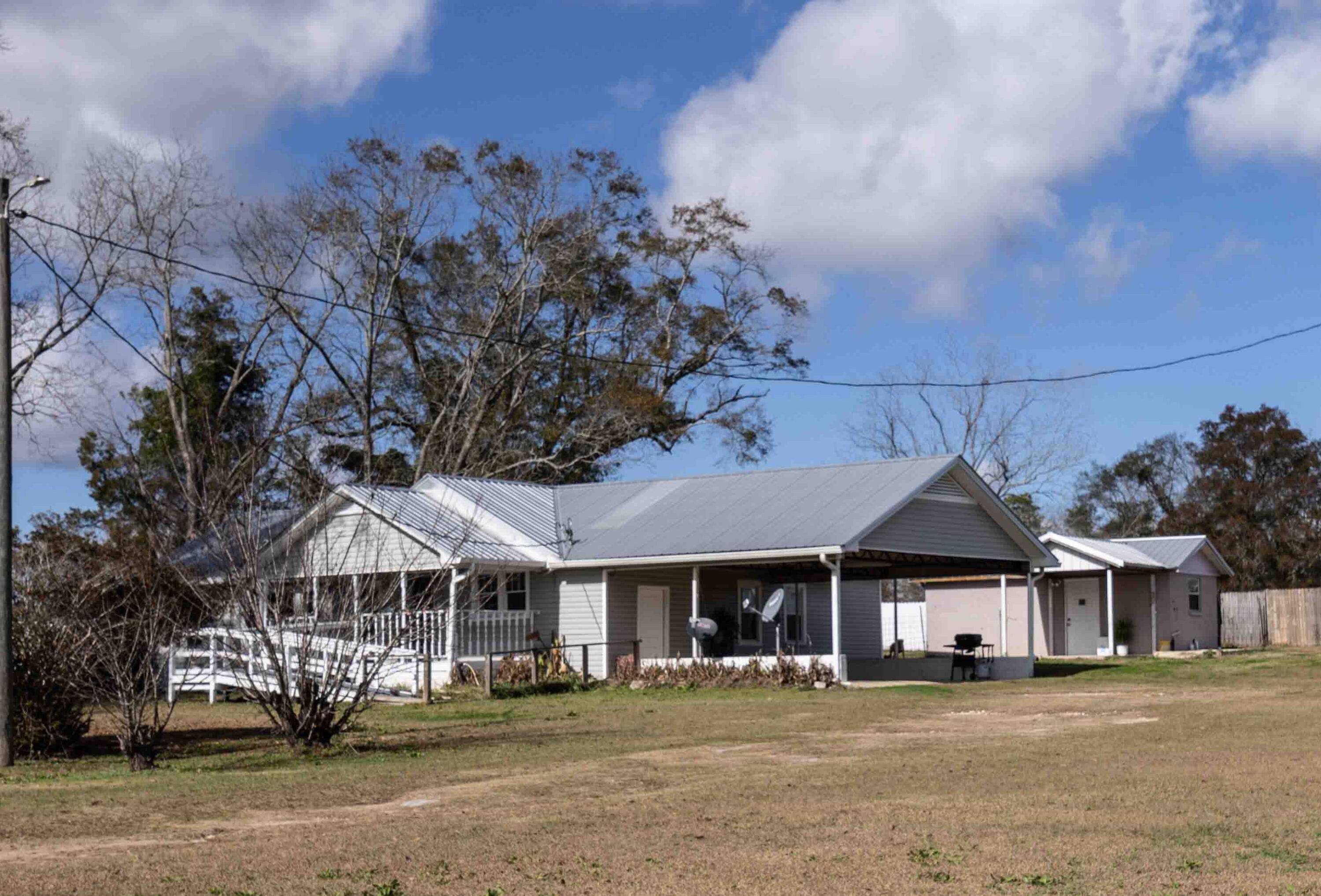 Escape to peaceful country living with this inviting ranch-style home located in the heart of Bonifay! Situated on over an acre of serene land, thoughtfully updated and meticulously maintained, this property offers modern comforts, practical spaces, and the perfect blend of charm and functionality. The main house features a warm and welcoming layout with spacious living areas, modern conveniences, providing plenty of room for family, guests, or a home office and a total of 4 bedrooms and 2 bathrooms. The detached guest house, updated in 2023, features new windows, fresh paint, and a cozy layout with a small kitchen and bathroom--ideal for hosting visitors, multi-generational living, or rental opportunities. The main home underwent significant updates to ensure peace of mind and energy efficiency, including: " New electric panel (2021) for the main house and a new electrical panel for the Morton Shed (2023). " New HVAC system (2017), serviced in 2024 to keep your home comfortable year-round. " New kitchen appliances, including a new dishwasher, for a sleek and modern culinary experience. " New washer and dryer ventilation system installed in March 2024. " Updated electrical outlets (2024) throughout the main house for added convenience and safety. " Fresh interior paint in both the main house and guest house, creating a bright and inviting atmosphere. " New ceiling fans installed throughout for improved airflow and style. For the hobbyist or craftsman, the property boasts a separately standing workshop/garage, located to the right of the main house. Whether you're working on your next project or need extra storage space, this versatile structure is ready to meet your needs. With over an acre to explore, there's room for gardening, outdoor activities, or simply enjoying the peaceful country air. Conveniently located near Bonifay's local amenities while still offering the tranquility of rural living, this property is a rare find. Make your dream of country living a realityschedule your tour today!