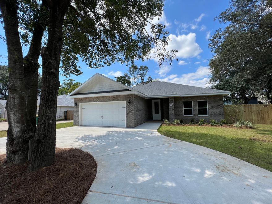 HOME IS COMPLETE!  With a full price offer, Builder will pay $2500 towards Buyer's costs and will pay Title, Survey and Doc stamps on the deed!  Located close to Bases, Beaches and Shopping!!! This Affordable BRAND NEW HOME by a Quality Builder is Loaded w/Extras! ALL COLOR CHOICES HAVE BEEN MADE. Solid surface Counter tops in Kitchen,  Breakfast Bar, Wood Cabinets with soft close drawers, Quality Fixtures, 10x20 back porch, wood look tile floors in foyer, kitchen, baths and Laundry Room. Master Bedroom is nicely sized. Tiled Shower in Master Bath and a separate tub.  Covered Lanai in Back.   Privacy Fence with one gate is included. Home includes Full Sod, Lawn Pump and Sprinkler System.