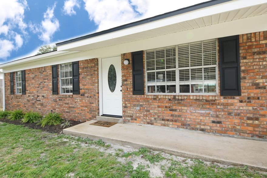 Welcome to your new home conveniently located to the beautiful beaches, military bases and shopping. This 3 bedroom and 2 bath home has just been remodeled to create a beautiful open floor plan perfect for your family.  The home features all new LVP flooring through out, updated kitchen with quartz counter tops and stainless steel appliances.  Special touches in the kitchen feature a large black sink with rose gold accents. Both bathrooms have all new fixtures with the master having a walk in shower. The home has also been updated with new lighting through out with recessed lights as well as new fixtures. The indoor laundry room features built in cabinets for extra storage. From the kitchen you have a fabulous screened in patio to entertain friends and family & opens up to your large yard. Updates: 
Roof- 2022
HVAC-2018
Hot Water Heater- 2018
Lawn pump - new 
