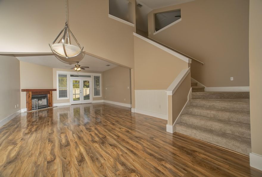 A true Florida gem... This beautiful home has just undergone a complete remodel and the owners spared no expense. The kitchen has all new custom built cabinets and granite counter tops. Matching stainless steel appliances from Whirlpool. The first floor features New hardwood floors, cozy wood burning fireplace with lots of light that comes through the french doors that go out onto the screened-in lanai. The master bedroom is located on the first floor which has a grand closet all women will love. The master bathroom is to die for... complete with double vanity, separate shower and porcelain tile. There is an extra bonus room upstairs as well that could be an office space or play room. For the man of the house, this home features an oversized 2 car garage, fenced in back yard, lawn irrigation system and four person Jacuzzi ! This house is in a great neighborhood which includes community Pool, Tennis courts, Basketball and children's playground. Be sure to add this one to your list of "Must See's", you will not be disappointed.