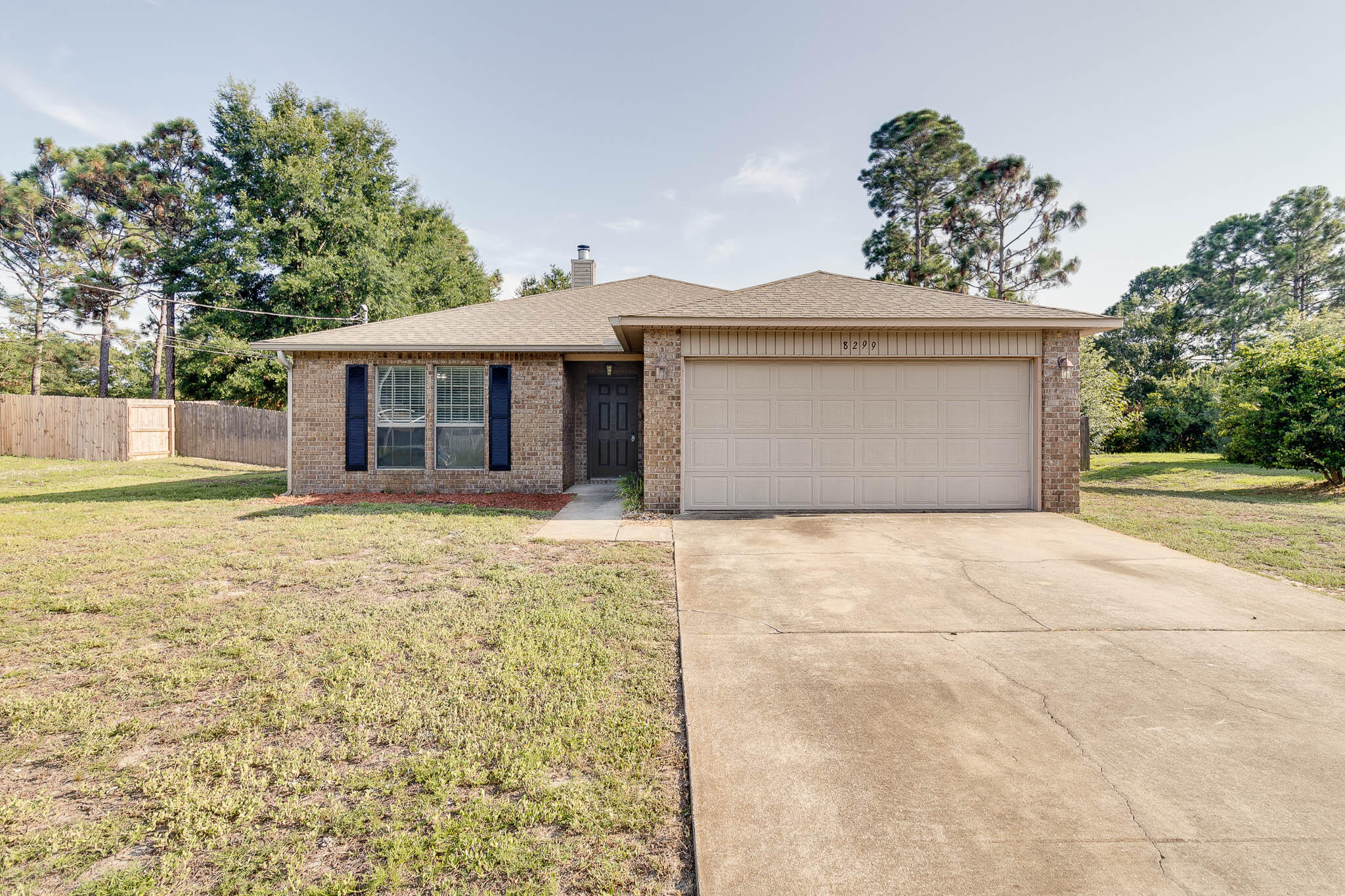 This beautiful 3 bedroom, 2 bath home is located in Navarre, and just minutes away from Navarre Beach. Situated on almost half an acre, the fully fenced in back yard boasts a large pool and deck, perfect for outdoor relaxation and entertainment. One unique feature is that there is no HOA.Inside, the home has been freshly painted, creating a clean and inviting interior. The kitchen features granite countertops and is equipped with stainless steel appliances, with a separate pantry and laundry room right off the kitchen. The bedrooms feature new Luxury Vinyl Plank (LVP) flooring, adding a touch of modern elegance. The primary bedroom is spacious and features a walk-in closet, and spacious bathroom with a soaking tub and double vanity sinks. This home is worth viewing!
