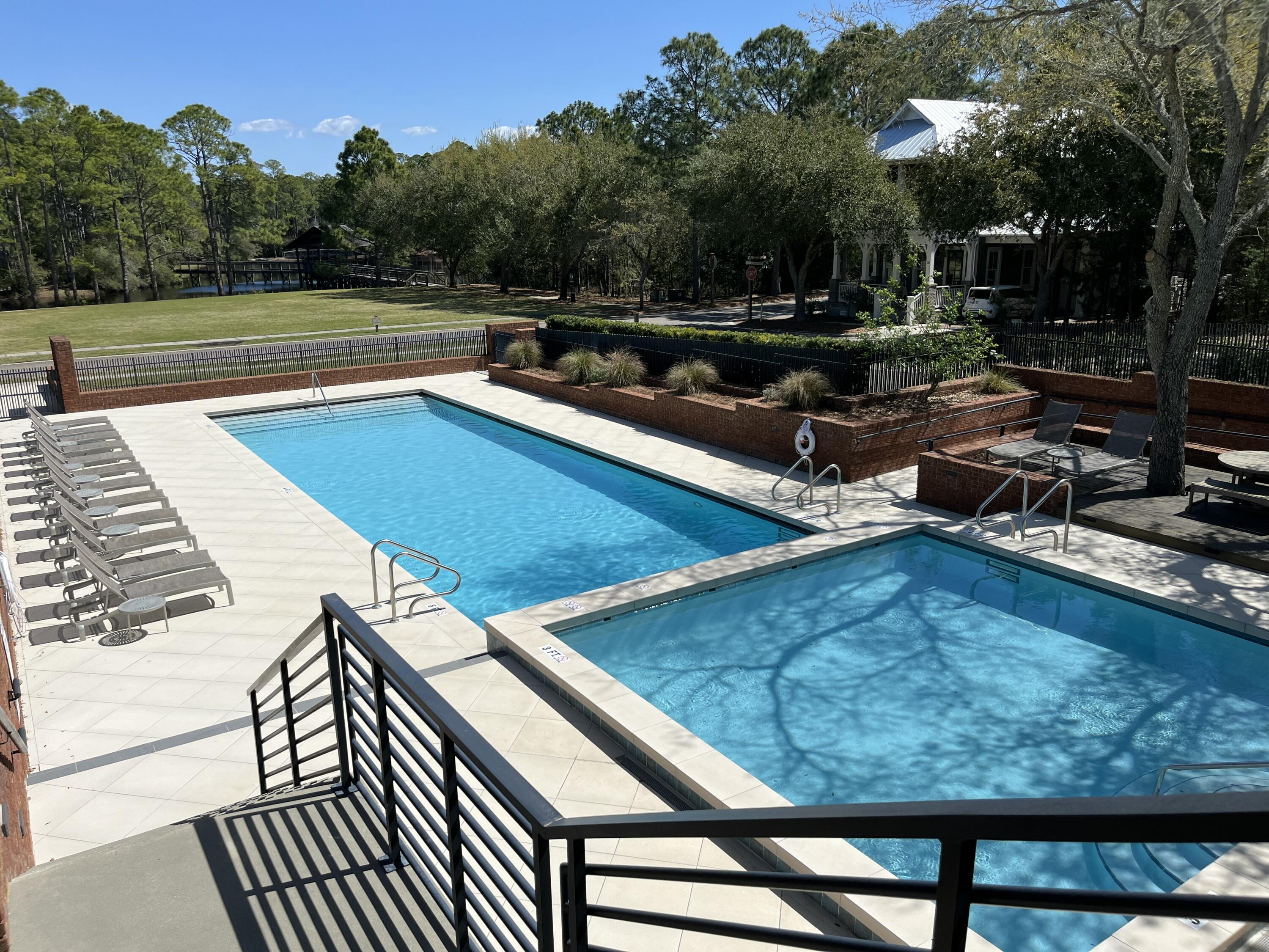 Rare corner lot homesite in sought after community of Forest Lakes right off Scenic Hwy 30A! Build your Forever Home nestled in this quaint tree-lined gated neighborhood just a quick bike or golf cart ride to Emerald Green Waters and White Sugar Sands! This listing features HOA approved home plans for a 3,194 sq foot home designed by Margaretten Architectural. Owners and their guests can enjoy catch and release fishing in the lake, a gated pool, bbq area, and picnics on the tranquil greens!