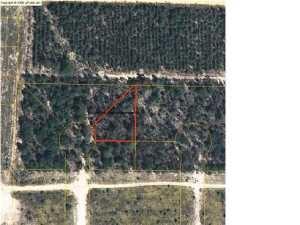 Wooded Lot located in Oakwood Hills Unit 2. Area will allow manufactured or site built homes. Seller would like to sell this lot before end of year! Make offer today! Buyer must verify all measurements.