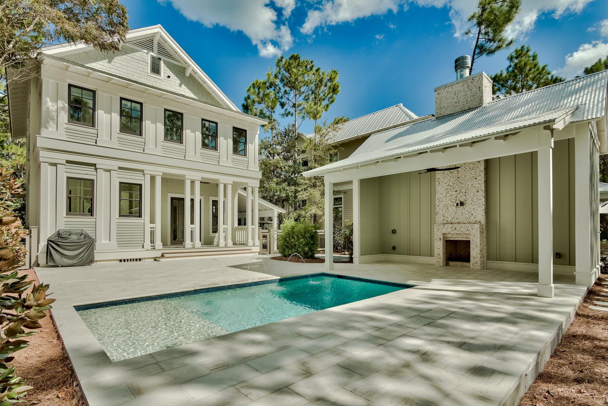 Don't Let this one get away!!! This beautifully renovated Home offers 2,787 sq feet, 4 bedrooms , 4.5 baths and a large private pool. The Kitchen is top notch with Sub-Zero and wolf appliances, Pecky Cypress Cabinets, quartz countertops and a Black Cypress island. Main level is bright, open and flowing with a kitchen, dining and living area as well as a guest bedroom and bath. Level 2 Offers a Large Master Suite with soaring cypress ceilings. separate sitting area, a walk in closet and a large Custom Bathroom. There are also 2 additional guest bedrooms with en-suite baths. Outside is an Incredible Private heated Pool with a Covered sitting area and tabby fireplace. Other added features are a gas grill, an 18 Seer A/C unit, tankless water heaters and a 2 story storage area.