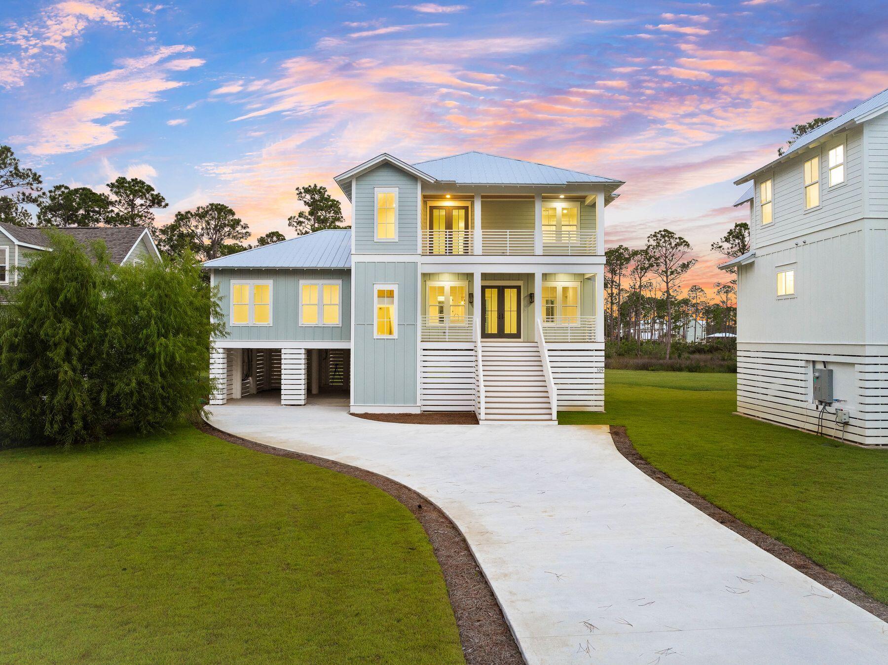 Backing onto the bayou, this new construction home offers a dream lifestyle for boaters with direct access to Choctawhatchee Bay. Occupying a generous half-acre lot, this three-story home is surrounded by nature and includes a brand-new dock and boat lift. A sweeping driveway leads to covered parking and a storage area for vehicles and watercraft. Steps lead up to elevated first-floor living with stunning views through a plethora of windows and doors. Covered balconies to the front and rear provide outdoor spaces for relaxing and enjoying the idyllic surroundings. Imagine living and entertaining in the huge family room with attractive hardwood flooring and designer-curated lighting. An oversized island with ample space for casual dining defines the gourmet kitchen area. Features include quartz countertops, pendular lighting and textured tiles on the backsplash. New appliances include a six-burner gas stove with a hood in light wood. French doors open onto a large balcony for alfresco dining and sunsets over the bay. The luxurious master bedroom has waterfront views. It has a magnificent master bathroom, which boasts a free-standing garden tub with stunning bayou views. An oversized bonus/game room completes the main level. Head upstairs to the top floor, where the open landing could be used as a second sitting area, home office or media space. Three well-proportioned bedrooms each have sleek private bathrooms and access to balconies. Close to 30A, this waterfront home is deceptively close to high-end dining, shopping, beautiful white beaches, schools and local amenities. It offers an exceptional lifestyle for boaters and those who appreciate the serenity of living on the bayou.