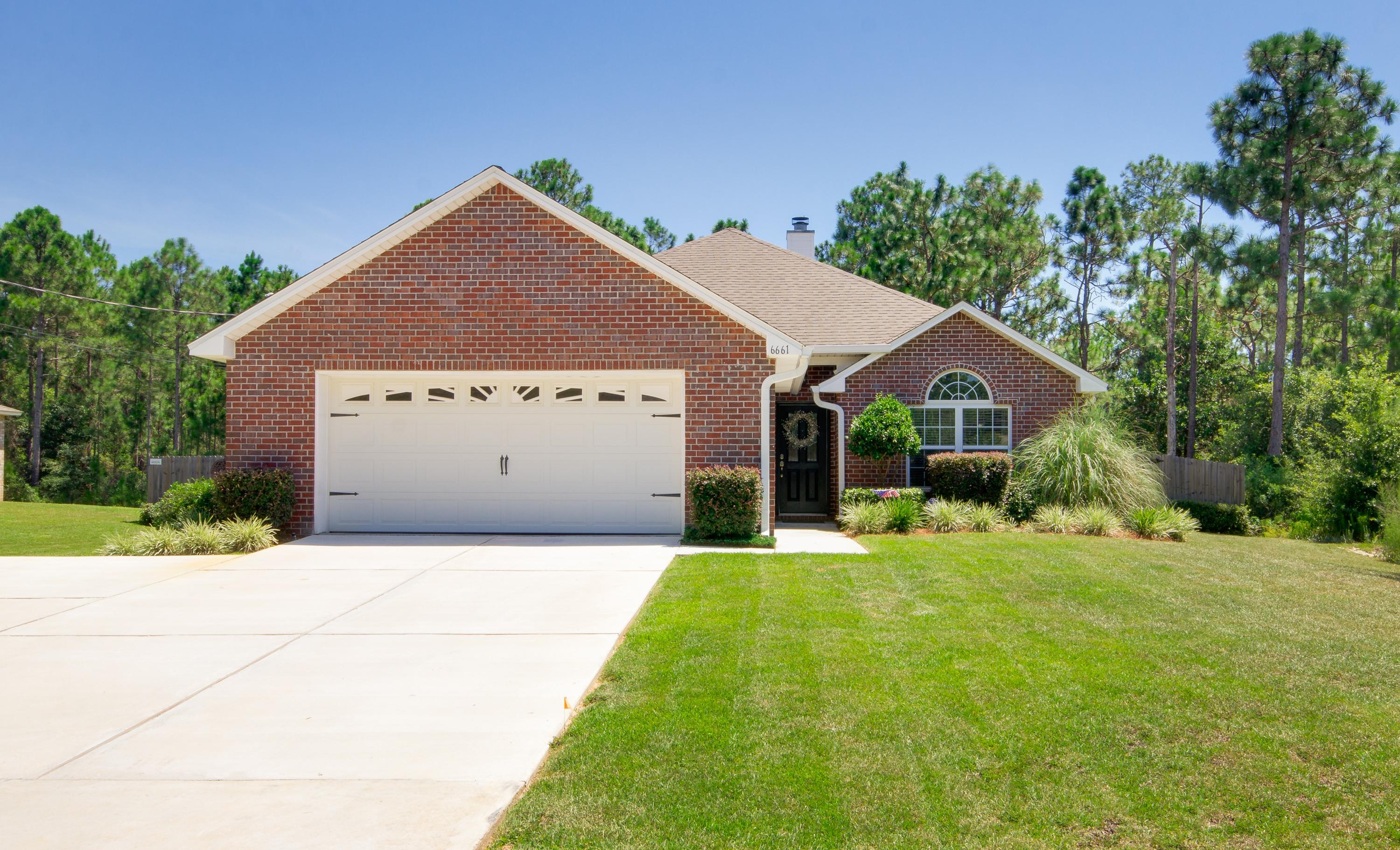 Walking in, you will be nothing but wowed by this immaculately-kept home with upgrades abound! Built with ICF construction, this home is sure to impress. Beautiful hardwood floors flow through the living area and bring you to the tile-floored kitchen and dining area. Stainless steel appliances and granite countertops round out an efficient kitchen. The master bedroom is large, and the master bathroom has dual vanities as well as a large shower. Two additional bedrooms are located along the front hallway, with an additional bathroom. The old screened porch has been enclosed and is heated and cooled. Stepping outside into the backyard, you are greeted with plenty of usable patio space (the sellers added some of it after the home was built) and a very large backyard.