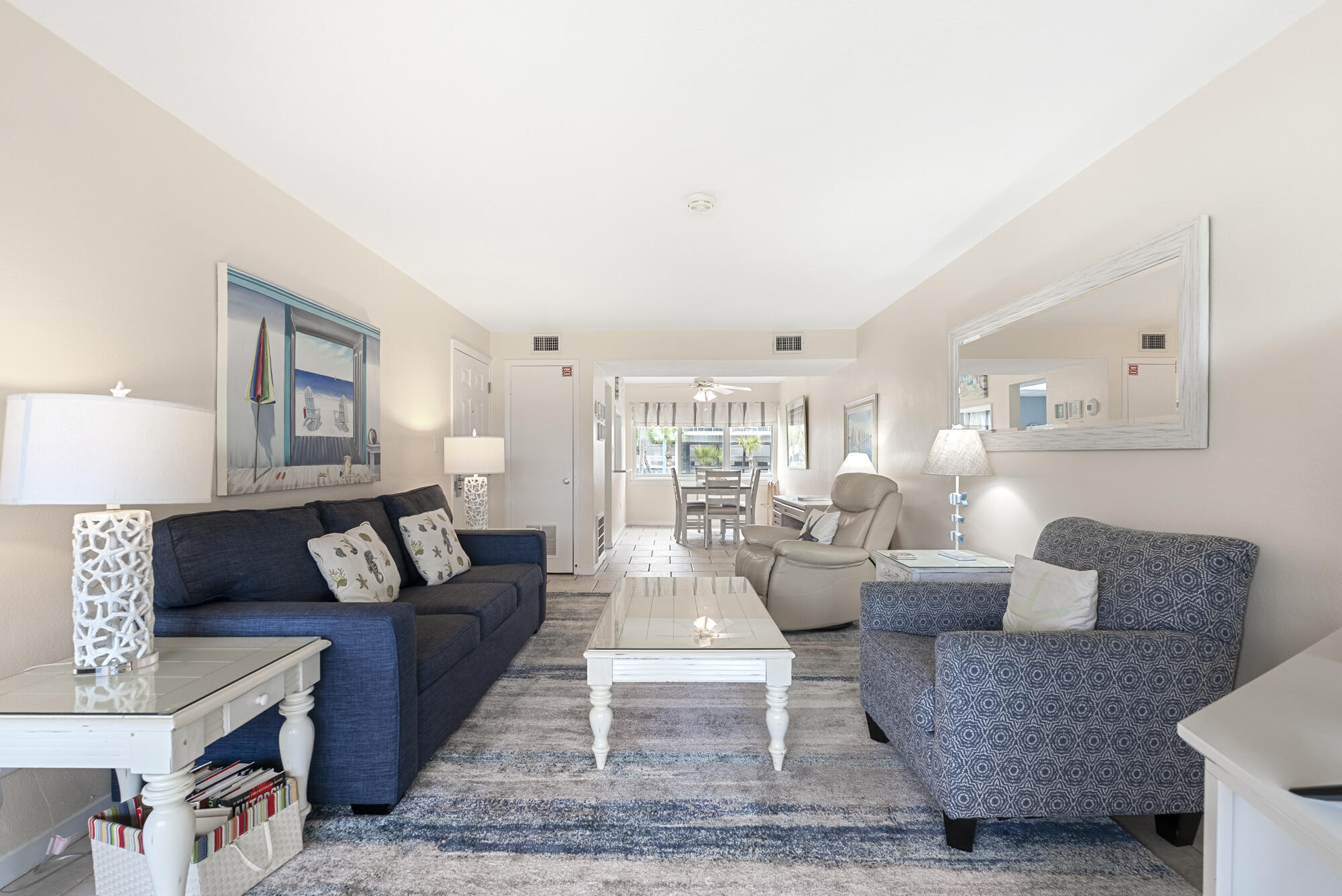 Don't miss your opportunity to own the most updated 2 bedroom 2 bathroom condo at Seapsray! The two bedroom units almost never make it to market and they are NEVER in this condition! With a peek-a-boo waterview from both sides of the condo, a 2018 water heater, 2019 A/C and a gross yearly income of around $44k per year being sold fully furnished - this unit is absolutely perfect for the investor looking for a turn-key property right on the water. The separate storage right outside the unit allows for a great owner's closet and the ample parking safely tucked into the gated community make this unit especially desirable. Schedule a private showing with your favorite agent!