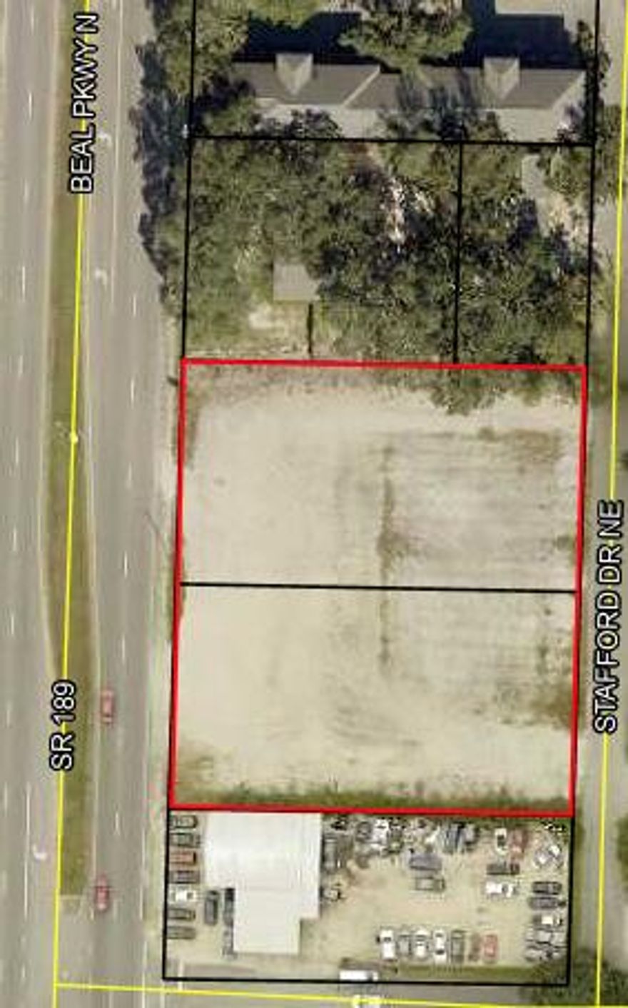 Cleared .92 acre parcel across from the Mercedes and BMW dealership on N Beal Pkwy, high traffic count, close to Hospital, property fronts 2 roads front and rear, great development parcel